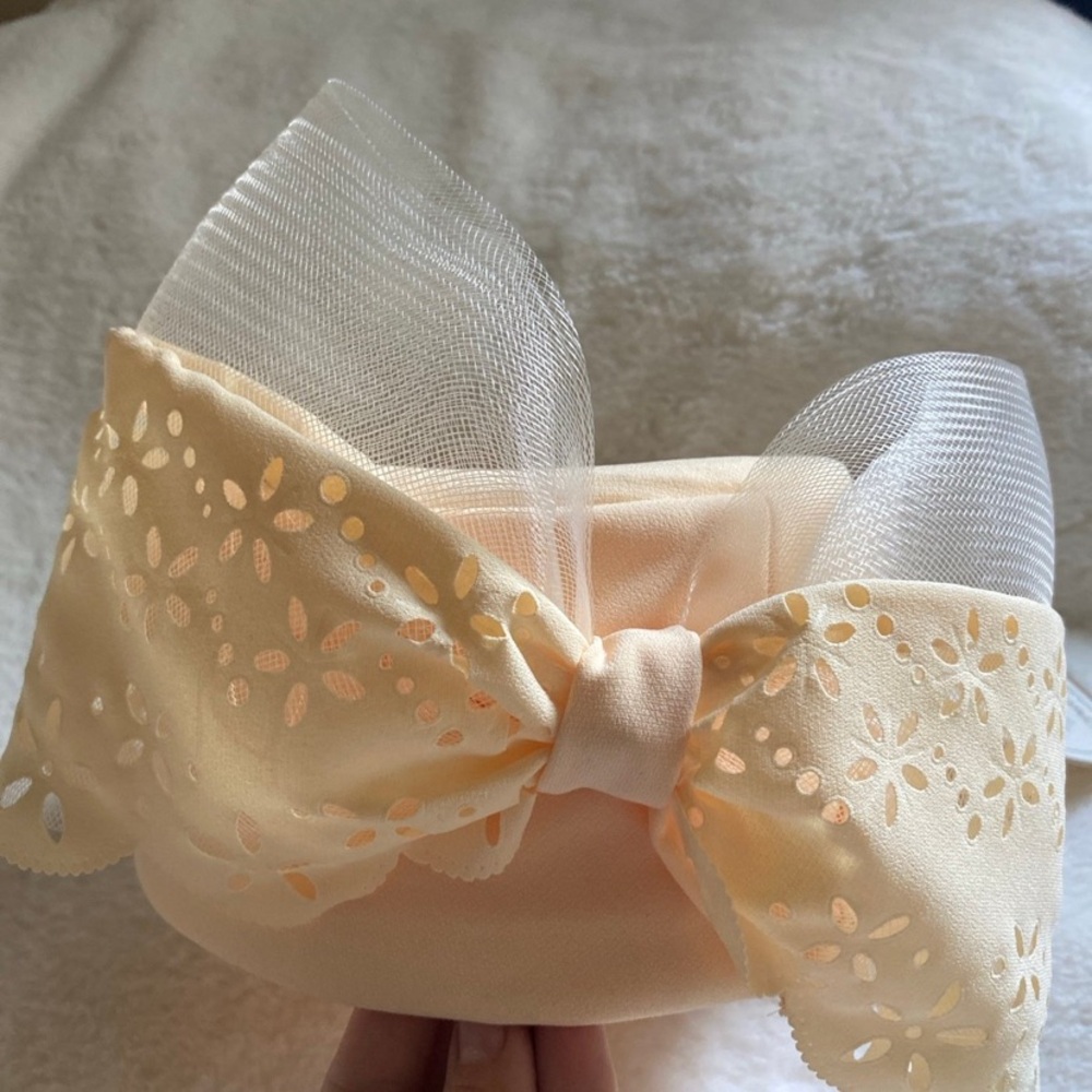 Elegant Cream Bow church lady hat.